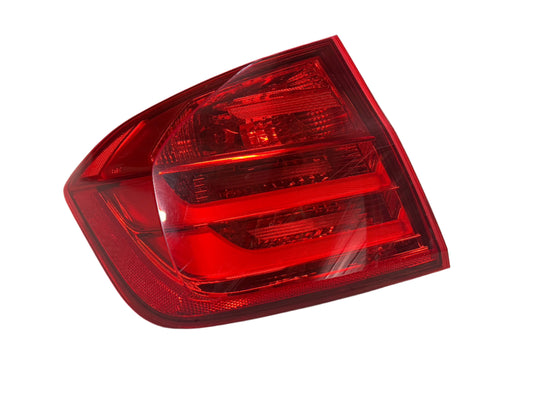 Genuine 2013 Bmw 328i Xdrive F30 left quarter panel mounted taillight.