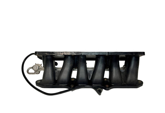 Genuine 1998-2004 Volkswagen Golf (MK4) VR6 lower intake manifold with fuel rail.