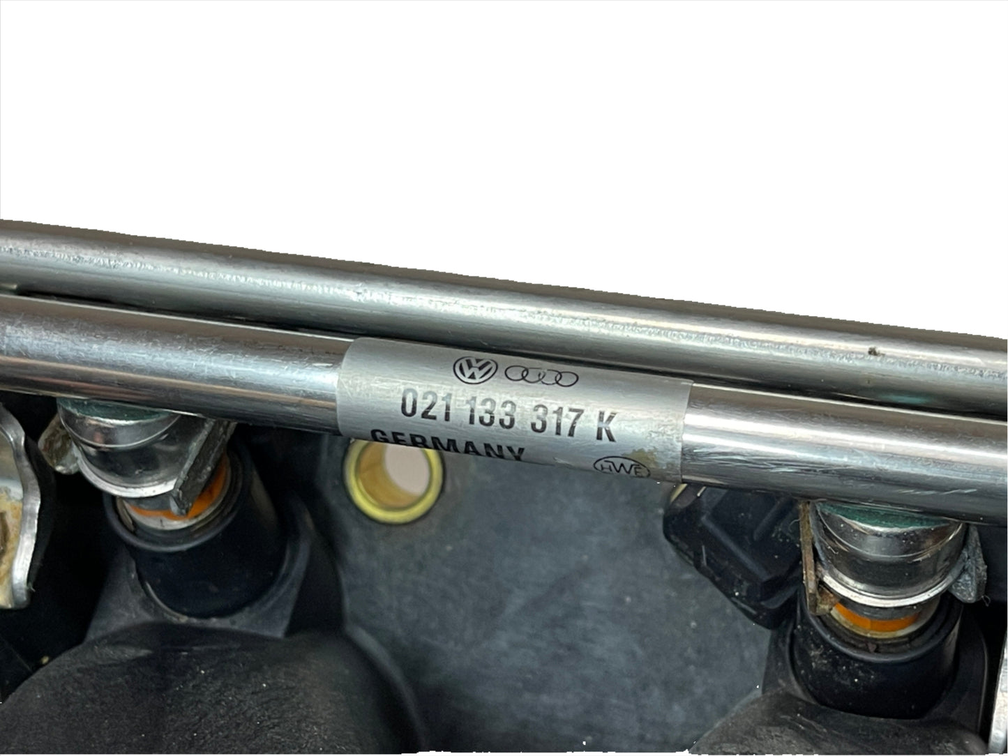 Genuine 1998-2004 Volkswagen Golf (MK4) VR6 lower intake manifold with fuel rail.