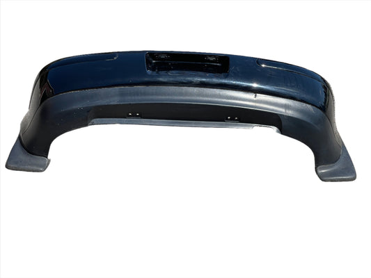 Genuine 1998-2004 Volkswagen Golf (Mk4) rear bumper with mud guards + License plate lights.