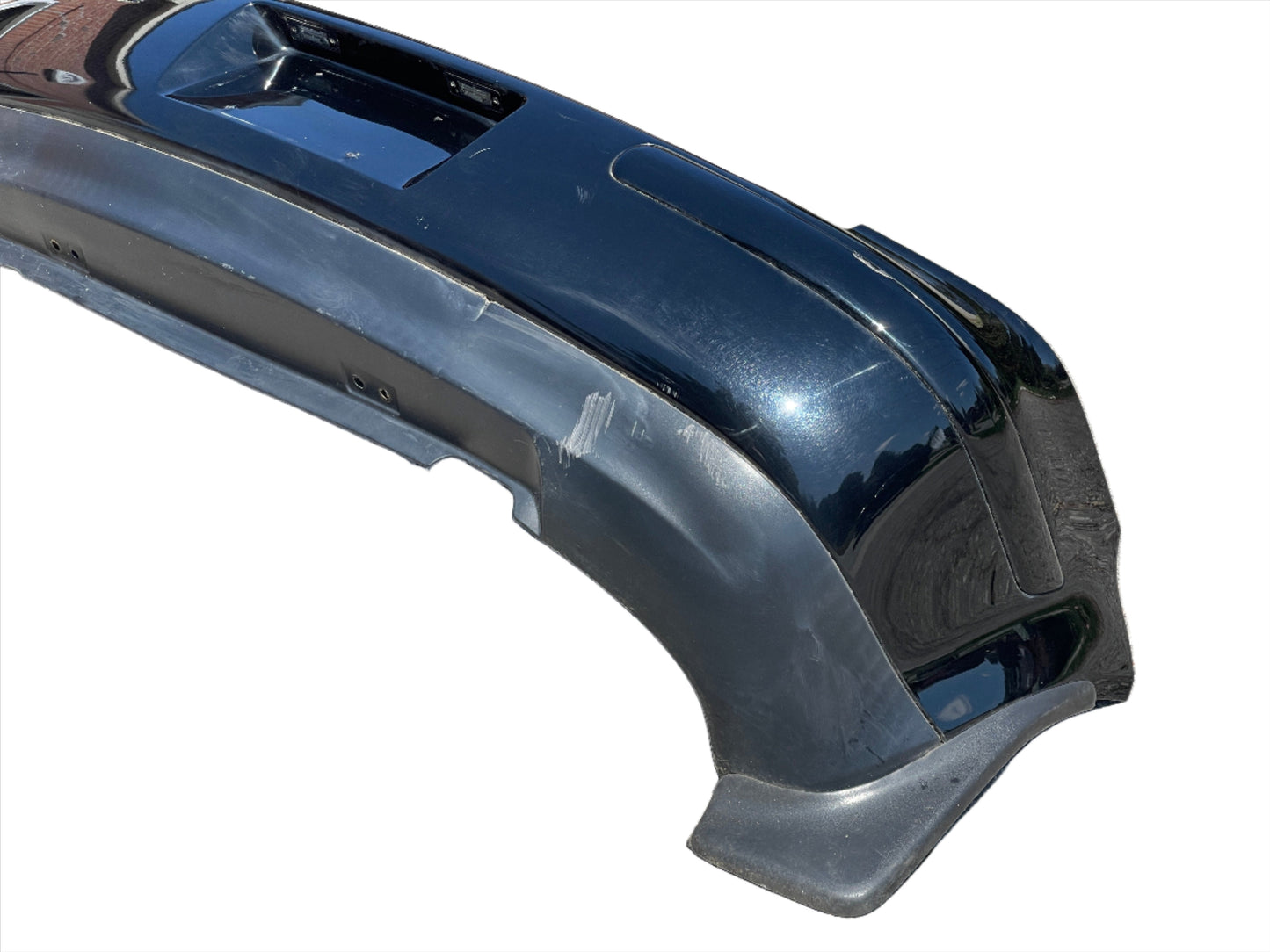 Genuine 1998-2004 Volkswagen Golf (Mk4) rear bumper with mud guards + License plate lights.
