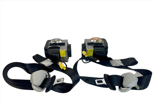 Genuine 1998-2004 Volkswagen Golf (Mk4) front seatbelt retractors.