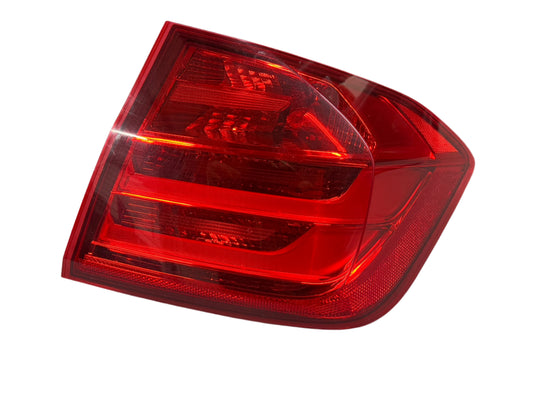 Genuine 2013 Bmw 328i Xdrive F30 right quarter panel mounted taillight.